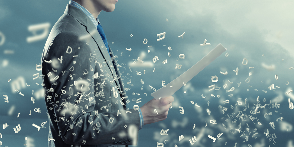 Side view of data privacy expert reading documents in hand to signify the upcoming Schrems III court case